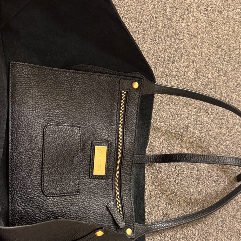Elegant Black Tote with Gold Details